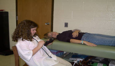 Photo of doctor and patient.